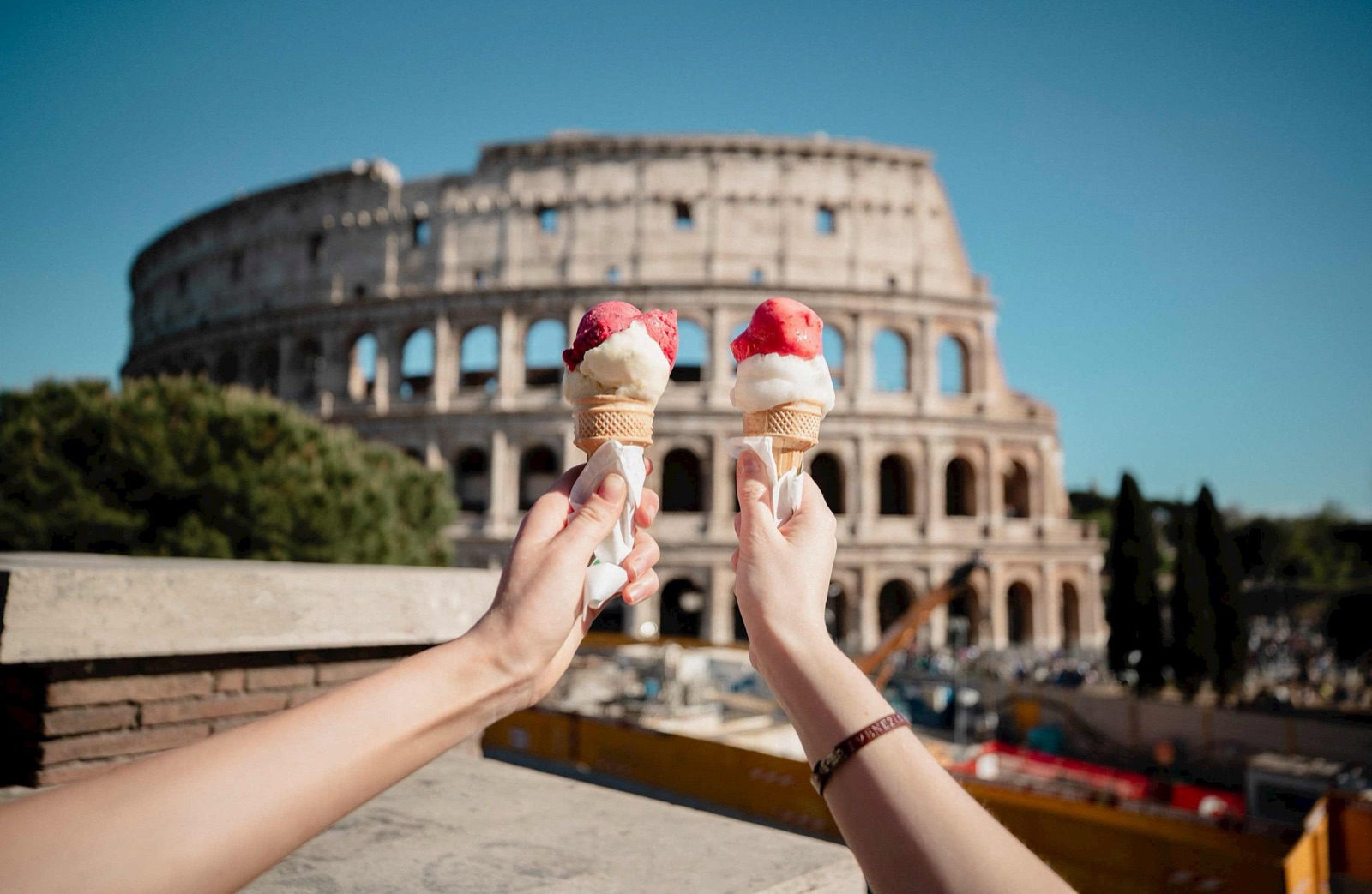 Gelato in front of the Colosseum, Rome, on a Trafalgar Italian holiday