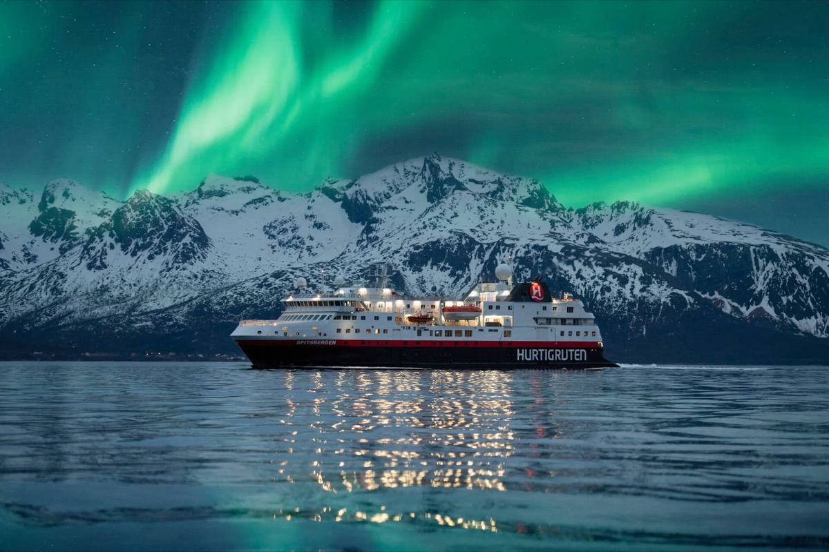Hurtigruten ship beneath the Northern Lights