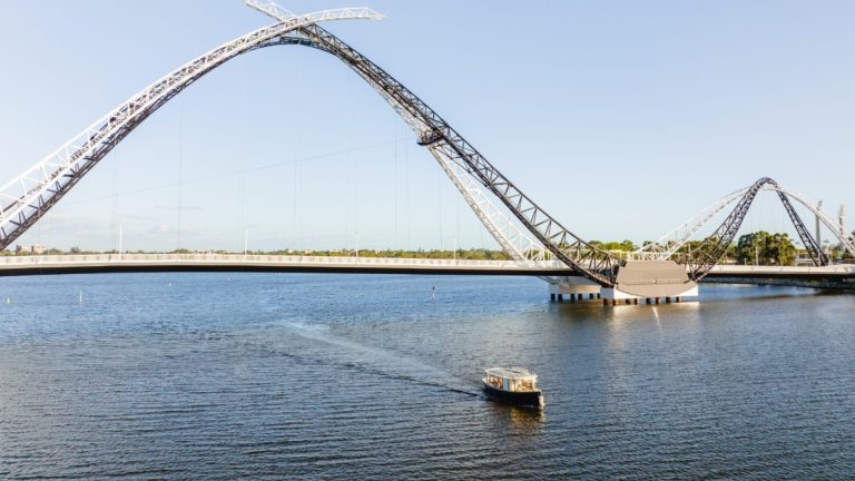 Boat Crossing Bridge
