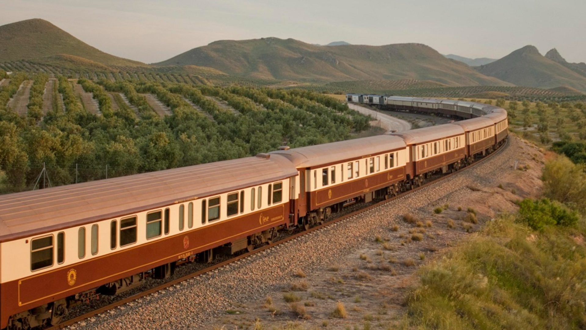 Train Passing in Majestic Mountains