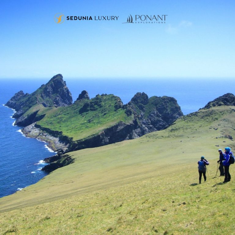 Hikers Trekking Up a Mountain