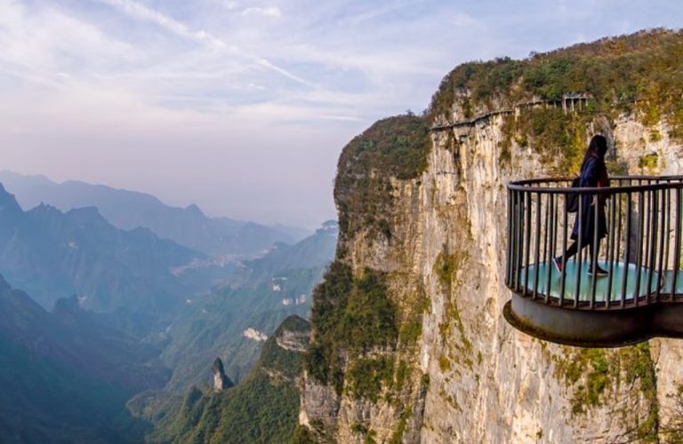 A person standing on a balcony